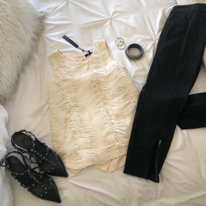Beautiful cream tank with tags.